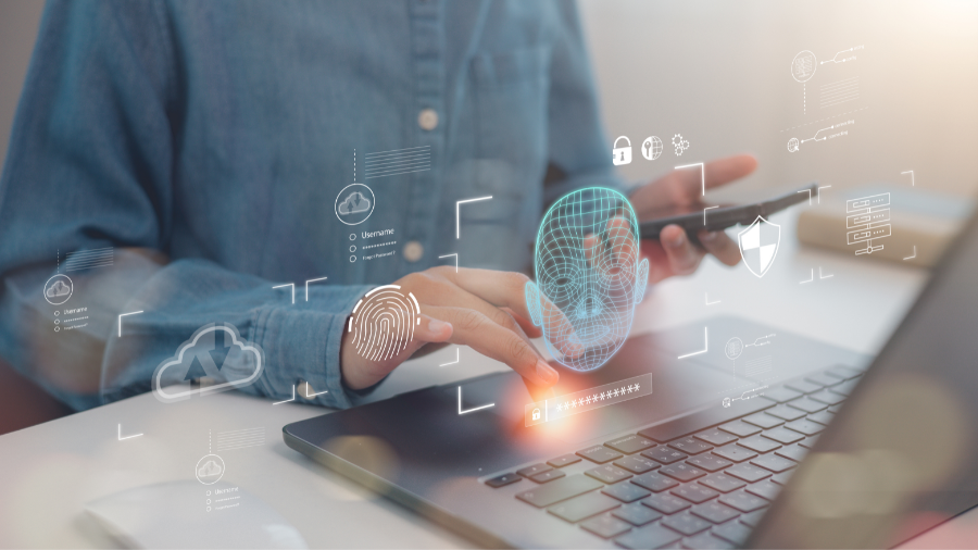 Person at computer creating fake ID